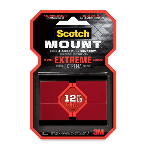 Cinta de montaje marca Scotch de doble cara con adhesivo de alta resistencia. Fija objetos a paredes, vidrios y superficies lisas sin clavos ni tornillos, soportando hasta varios kilos de peso.